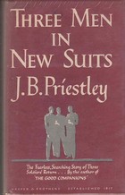 Three men in new suits
