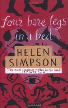 Four bare legs in a bed

